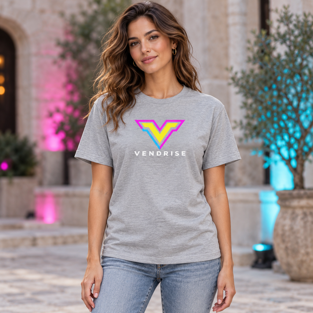 Model wearing the heather grey VendRise neon logo T-shirt in a courtyard with pink and cyan accents